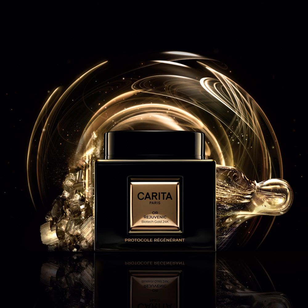 An elegant black jar of Carita Paris skincare product, featuring a gold label, is illuminated against a dark background with swirling golden and sparkly accents, creating a luxurious and enchanting atmosphere.