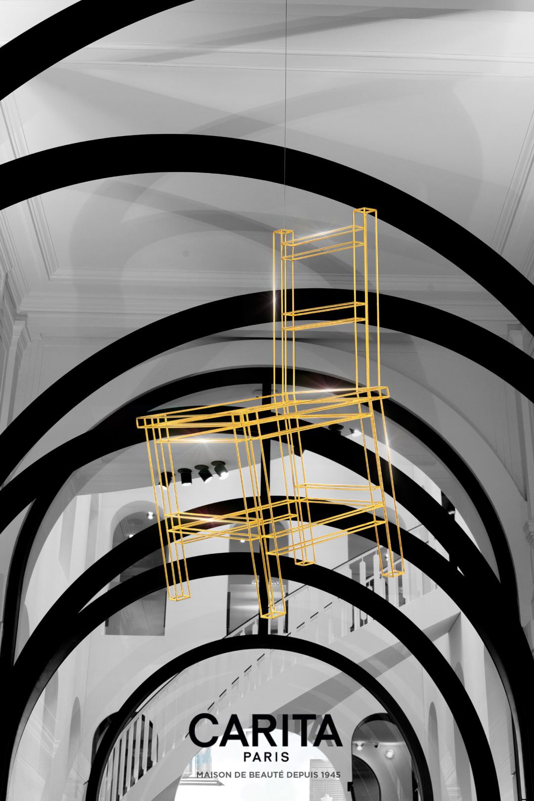 A modern, artistic installation featuring two outlines of chairs in bright yellow, suspended against a black and white architectural backdrop with curved lines. The image includes the text "CARITA PARIS MAISON DE BEAUTE DEPUIS 1945" at the bottom.