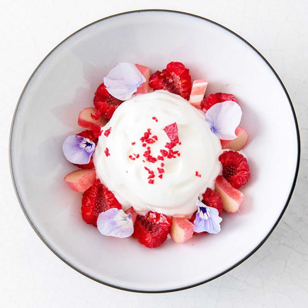 A dessert with red berries and flowers from the Rosy and Maria restaurant.